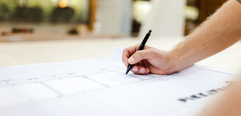 Photo by Pickawood person writing on white paper
